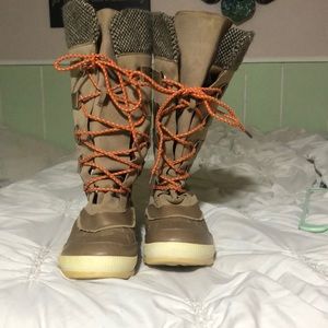 Tall brown duck boots
